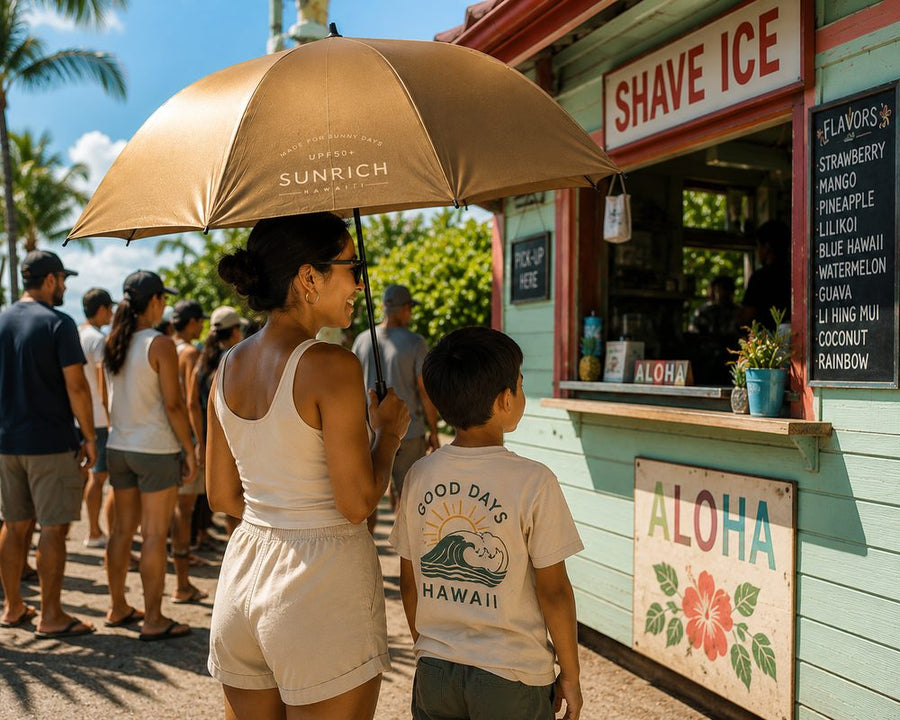 A mother and son wait at a shave ice stand beneath the gold SUNRICH Sun Shade